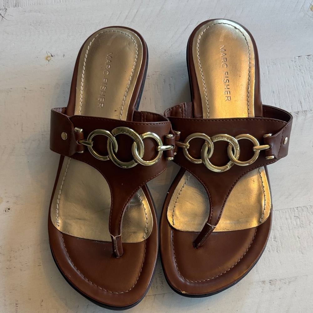 Marc Fisher rich brown leather Sandals with Gold Chain logo Detail.